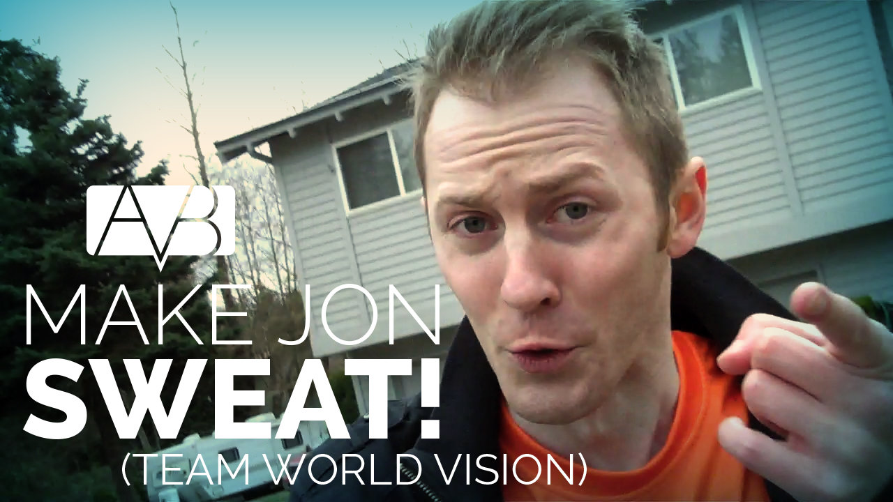 Jon running outside wearing a bright orange shirt
