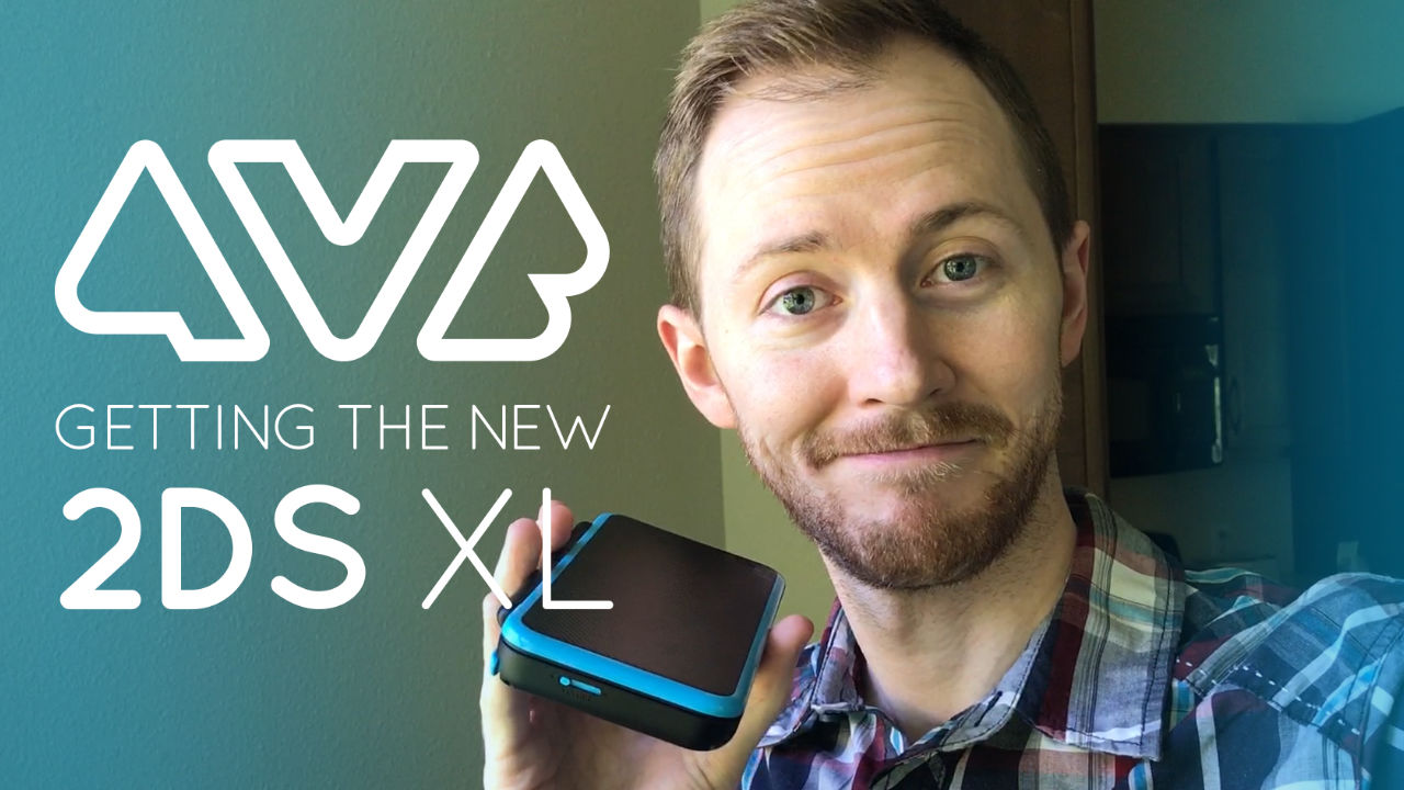 Jon holding a Nintendo 2DS XL