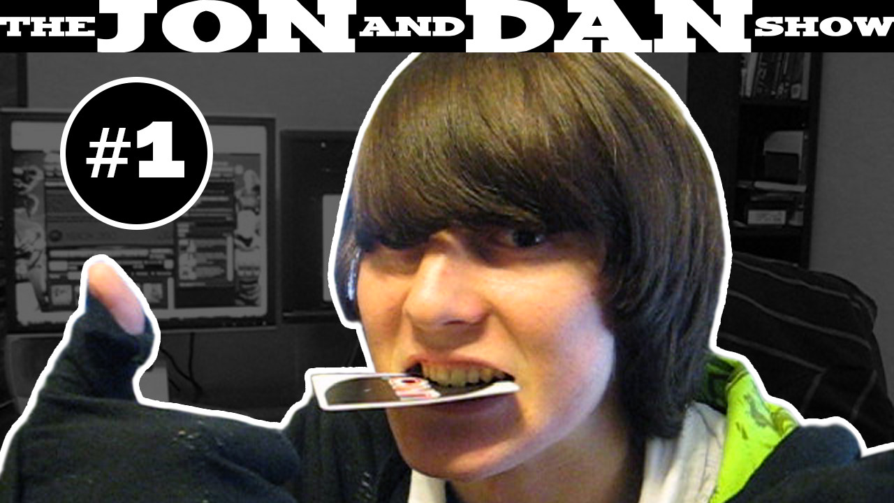 Dan giving a thumbs-up while biting an Uno card