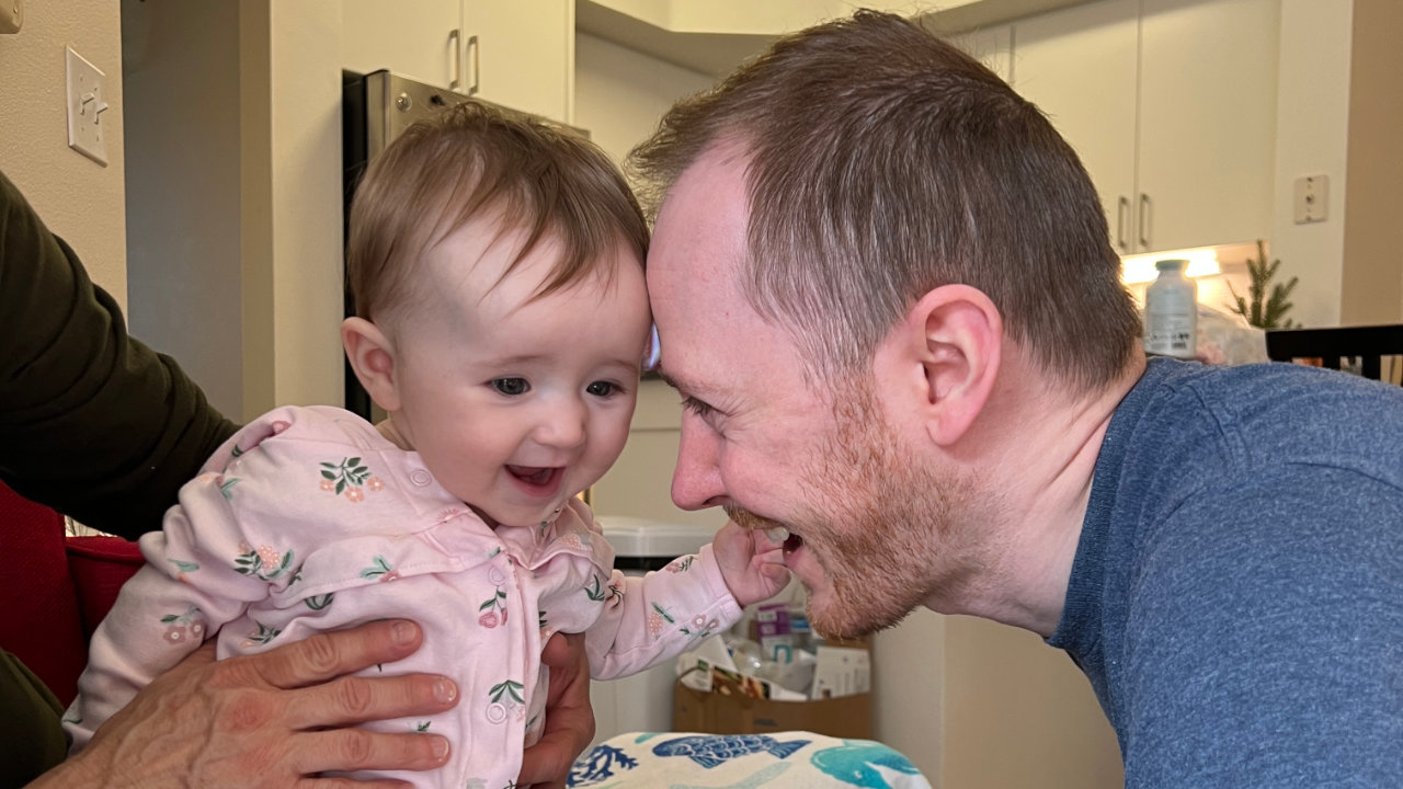 Olivia and daddy bonking heads