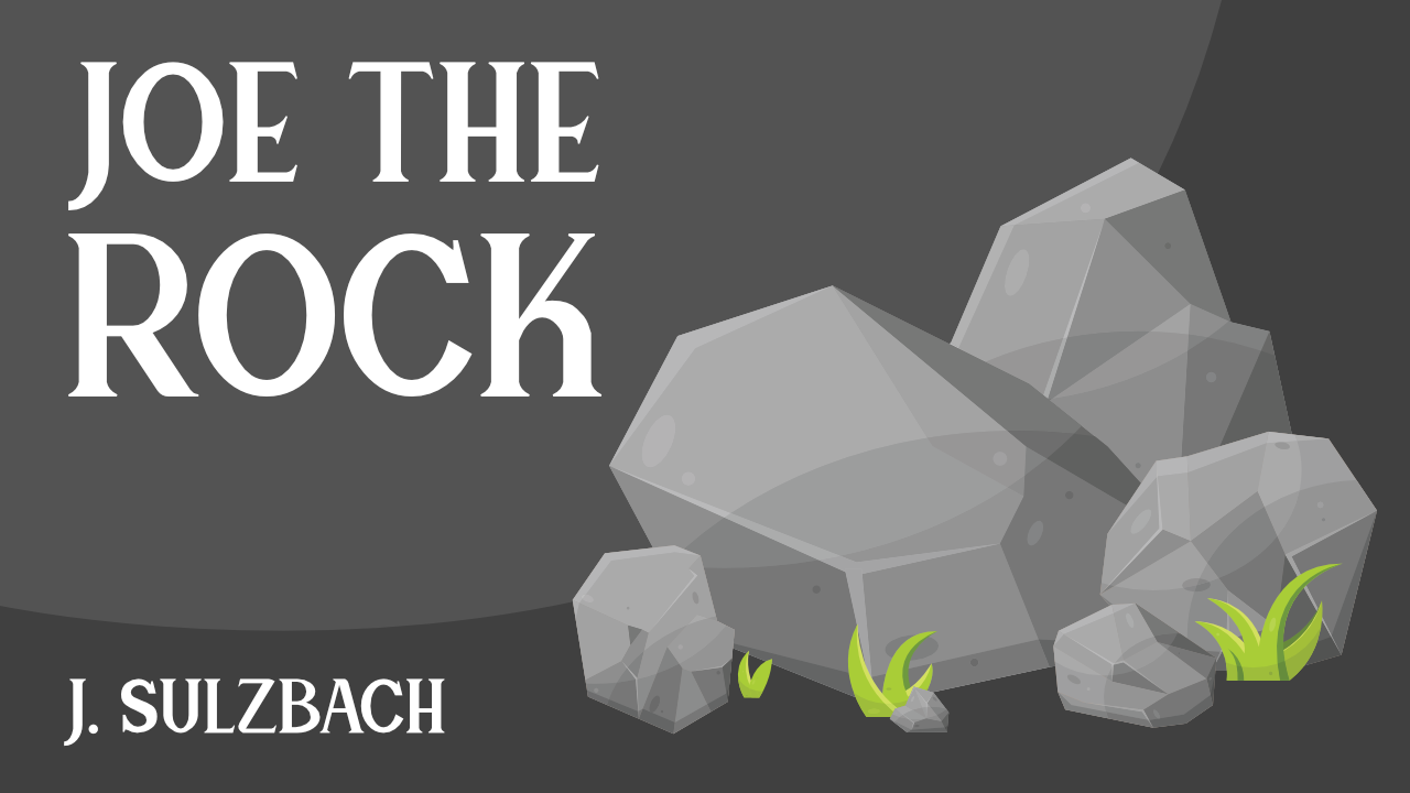 A pile of rocks with bits of grass